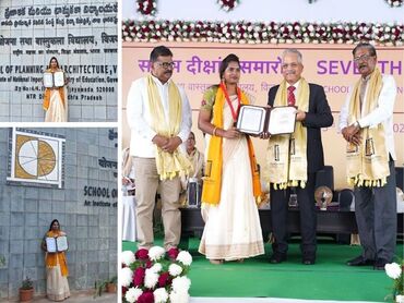 Two men in bicycle jerseys sitting outside at table having coffee