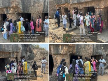 Two men in bicycle jerseys sitting outside at table having coffee