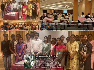 Two men in bicycle jerseys sitting outside at table having coffee